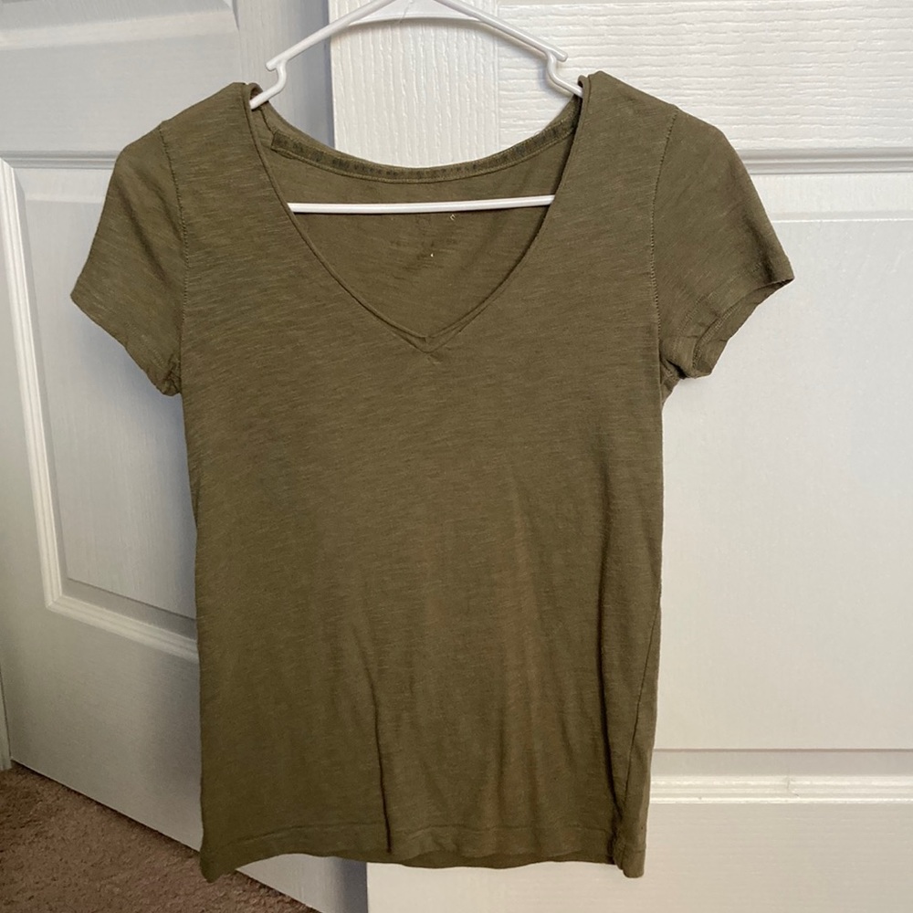 Brand is Prince & Fox. Size is unknown but fits like a small. Dark greenish.